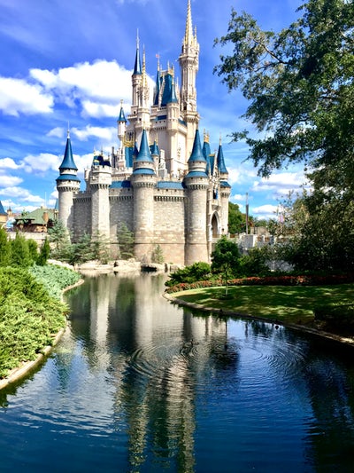 Cinderella Castle reflected in water.