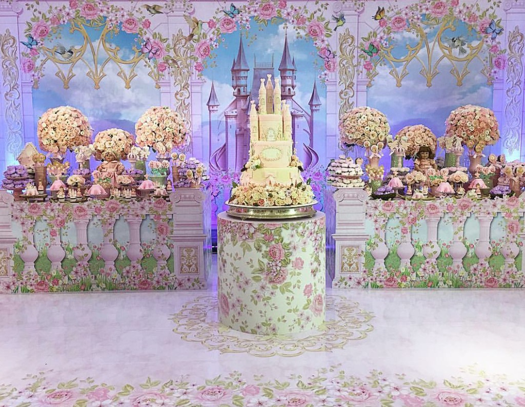 Floral castle themed birthday party table.