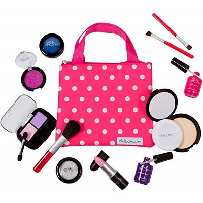 Pink polka dot makeup bag with cosmetics.