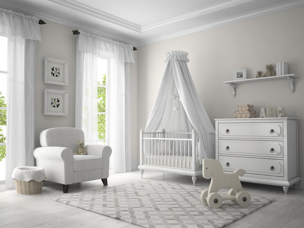 Baby Nursery with White Furniture