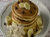 stack of pancakes with bananas