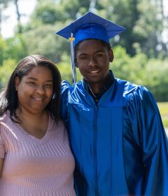low-income mom and Son College Graduate free tuition