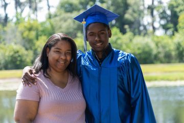 low-income mom and Son College Graduate free tuition